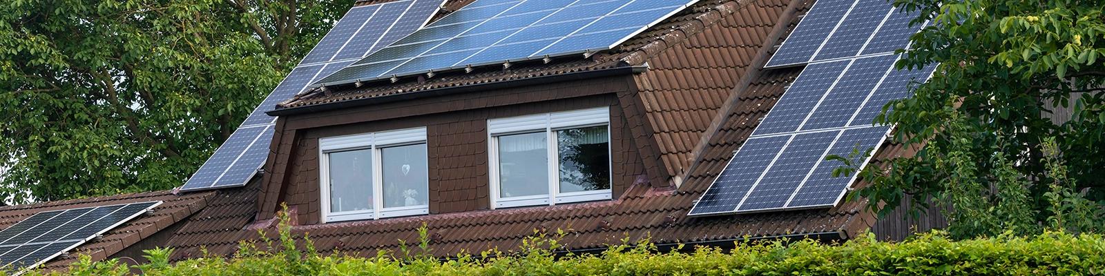 Wide Shot of a Home Exterior with Solar Panels 